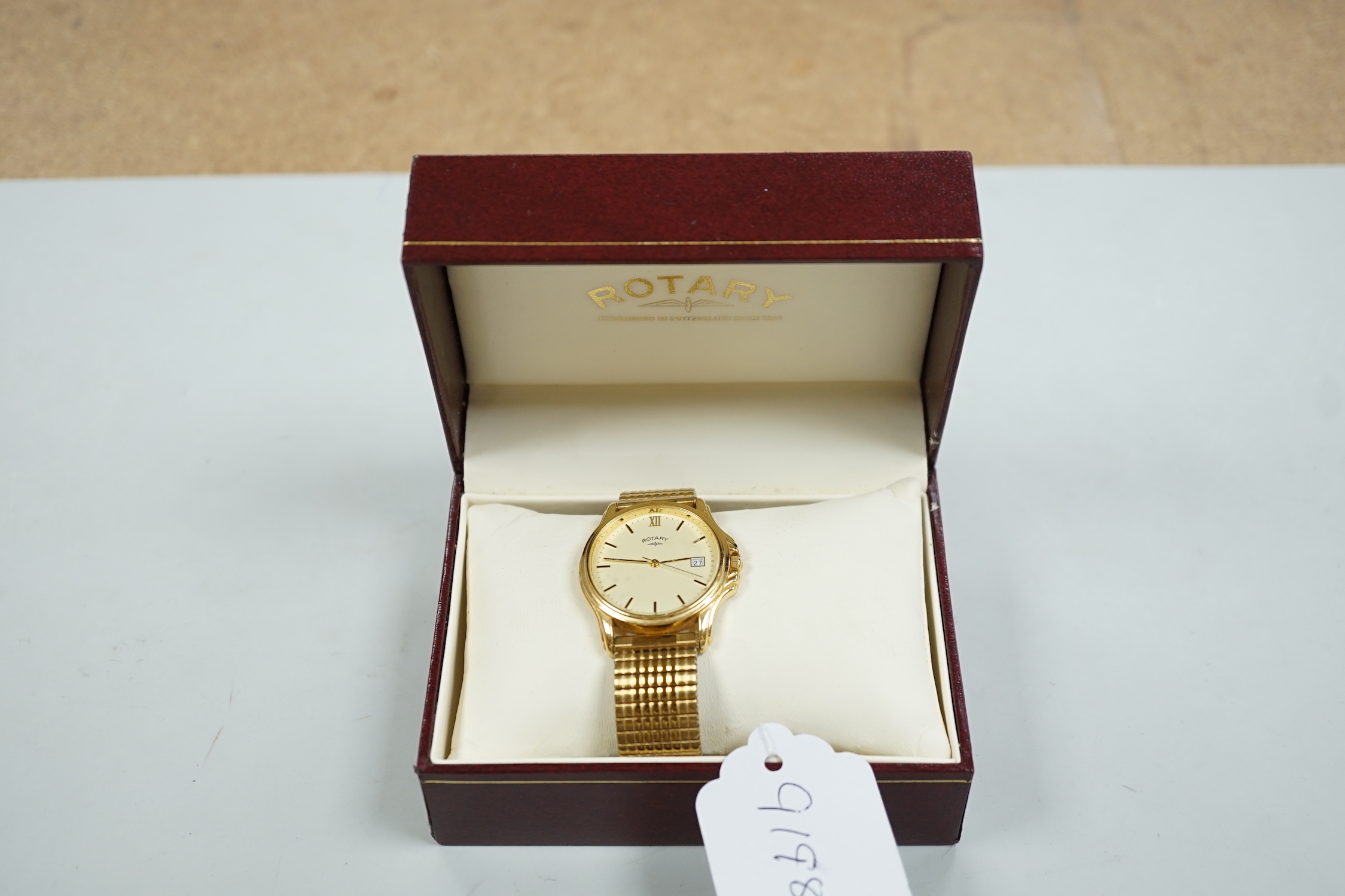 A gentleman's modern steel and gold plated Rotary quartz wrist watch, with date aperture, on associated flexible bracelet, with Rotary box.